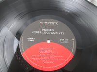 Load image into Gallery viewer, Dokken Under Lock And Key 60458-1 LP Vinyl
