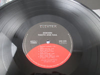 Load image into Gallery viewer, Dokken Tooth and Nail Elektra 60376 Shrink LP Vinyl

