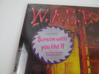 Load image into Gallery viewer, W.A.S.P. Live In The Raw CLT 48053 Hype LP Vinyl
