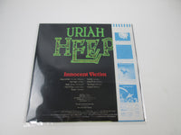 Load image into Gallery viewer, Uriah Heep Innocent Victim Bronze P-10441B with OBI Japan LP Vinyl
