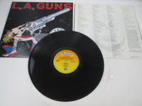 Load image into Gallery viewer, LA Guns Cocked And Loaded 838592-1 LP Vinyl

