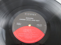 Load image into Gallery viewer, Dokken Under Lock And Key 60458-1 LP Vinyl
